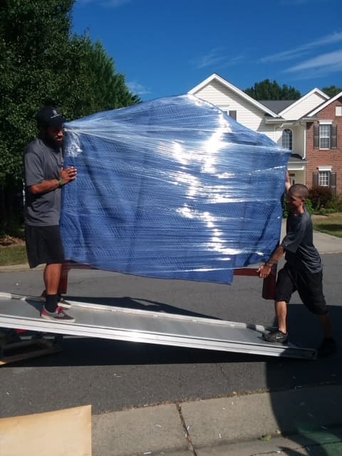Two Men and a Truck Moving - photo 2